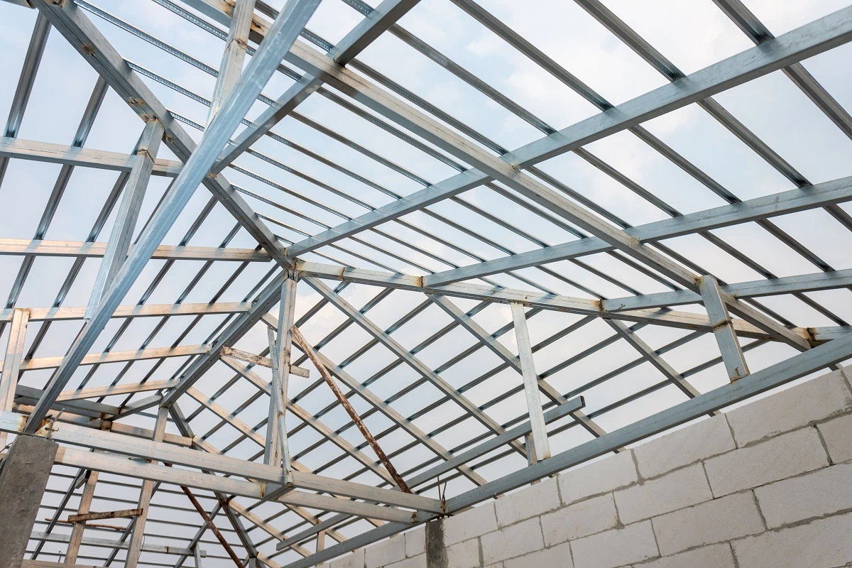 Structure of steel roof frame for home construction. Concept of