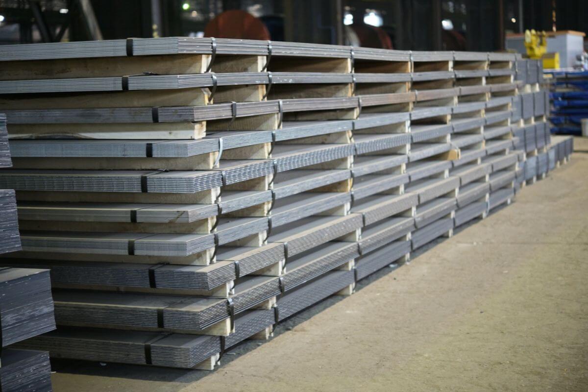 Durable steel plates stacked for industrial use.